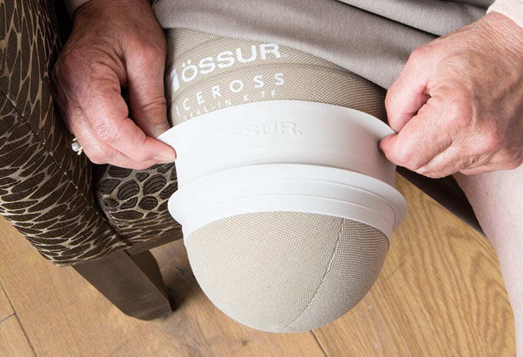 A man wearing his leg pad