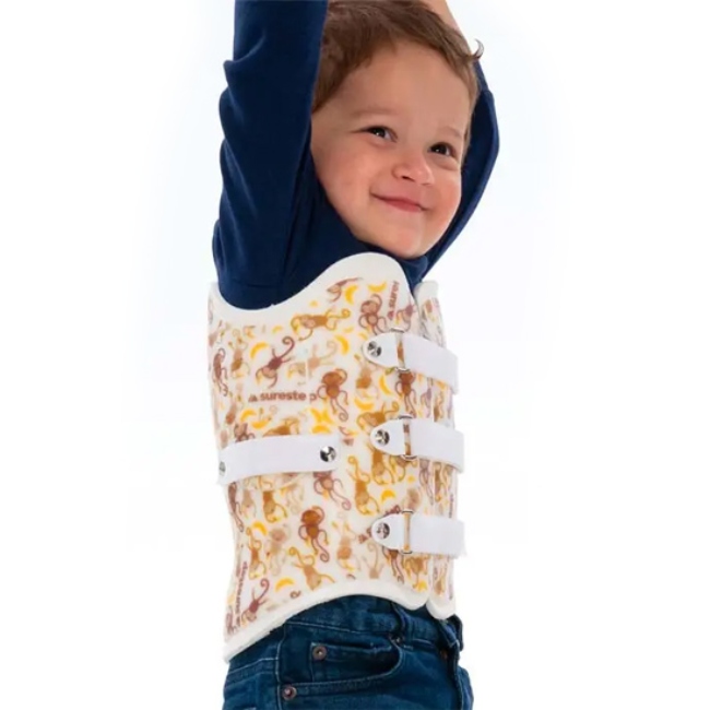 A young boy is wearing a pediatric Surestep TLSO for support in New York, New Jersey, & Connecticut