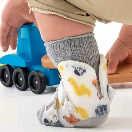 A toddler wearing a Surestep SMO with heel modification available in New York & New Jersey